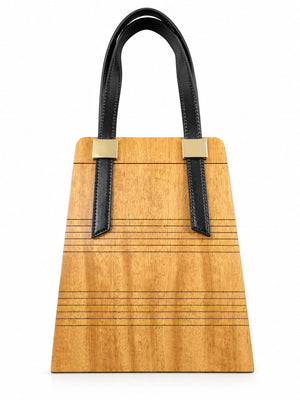 Mimosa — sac en bois Movingui figuré porté par une femme