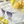 Load image into Gallery viewer, Lunettes Chasselas posées sur du verre givré près de raisin blanc chasselas
