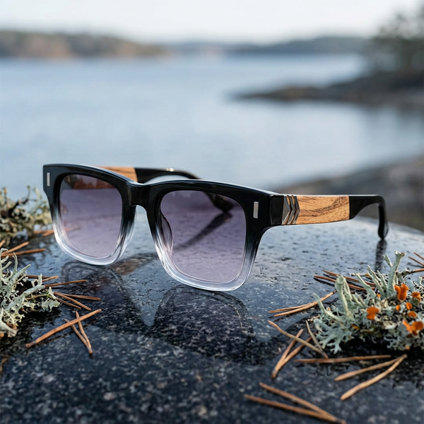 Lunettes Stockholm sur une pierre dans un paysage côtier nordique
