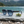 Load image into Gallery viewer, Lunettes Milan sur une pierre au bord d’un lac alpin
