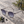 Bild in Galerie hochladen, Lunettes Genièvre posées sur une pierre grise près de baies de genièvre

