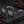 Load image into Gallery viewer, Lunettes Aronia posées sur une pierre noire avec des baies d’aronia
